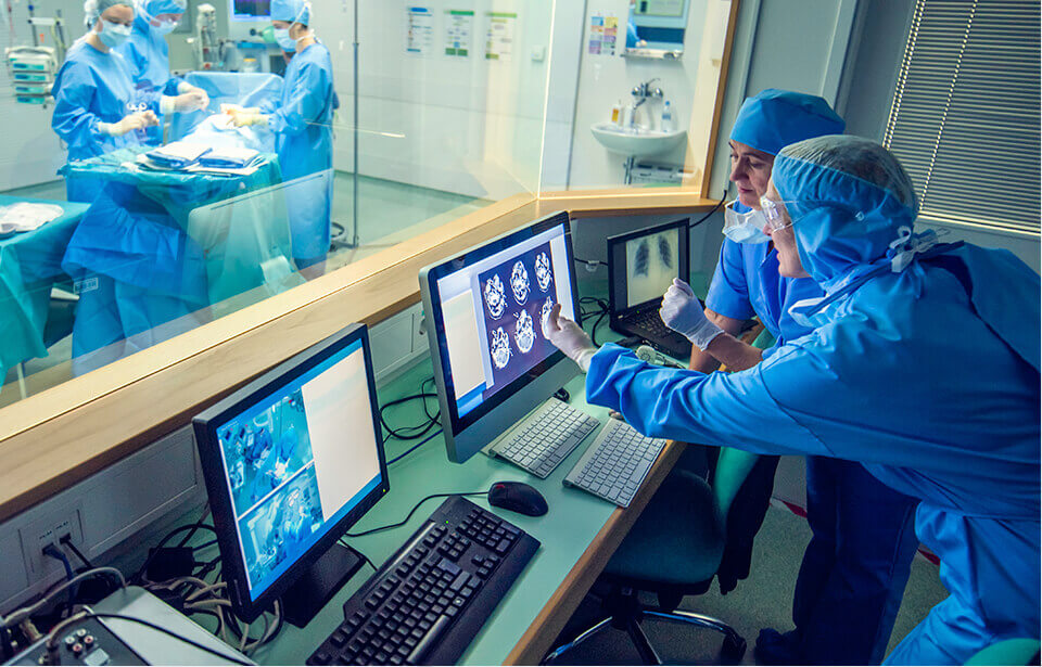 Lab workers in control room