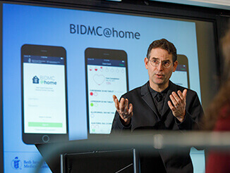 John D. Halamka, M.D lecturing